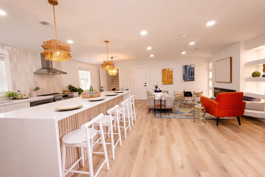 Warm Modern Kitchen with Fluted Wood Island Design
