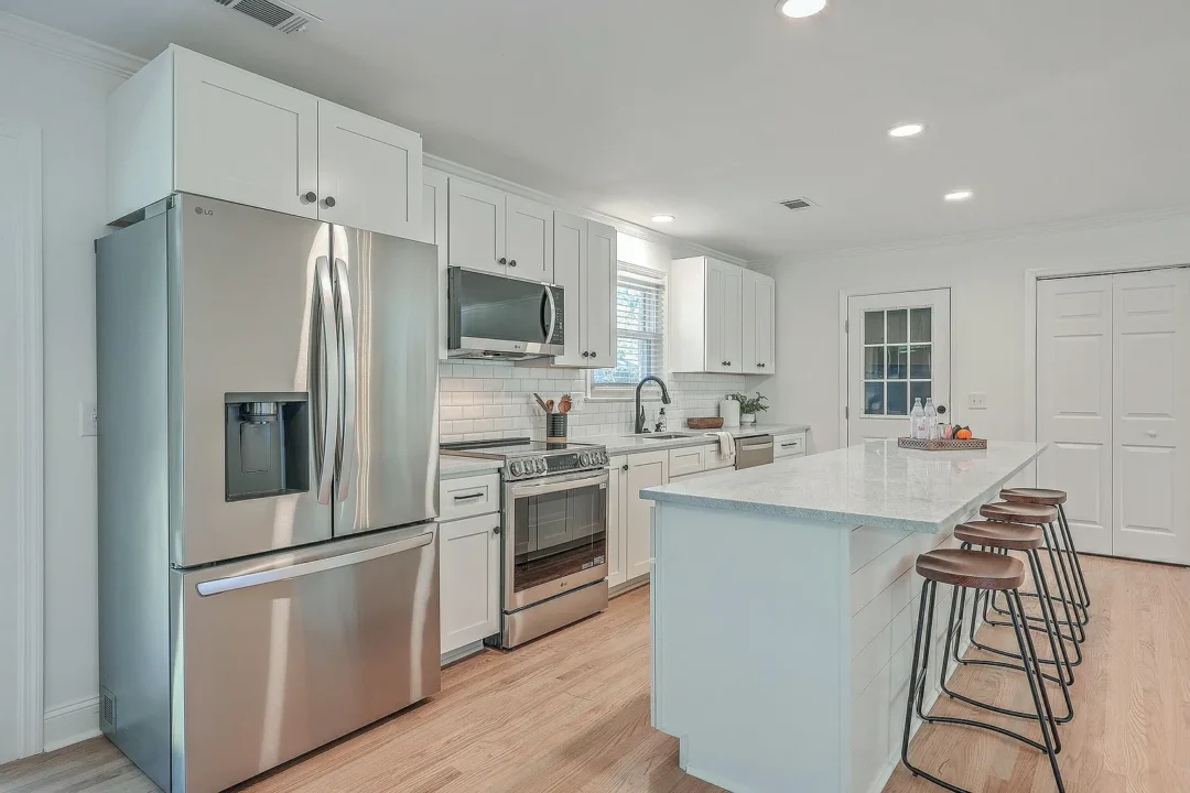 Classic White Kitchen with Open Concept Design
